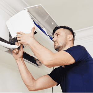 Hermes doing general servicing of aircon himself