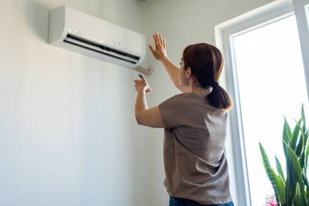 air conditioner is blowing hot air