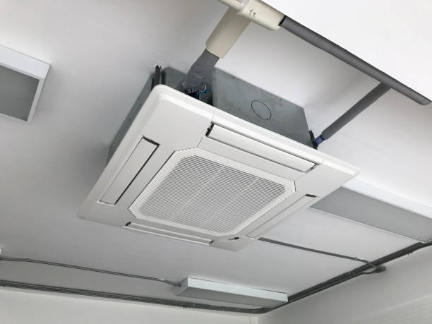 Ceiling type 4 directions air vent system hanging air conditioner unit in a modern office building