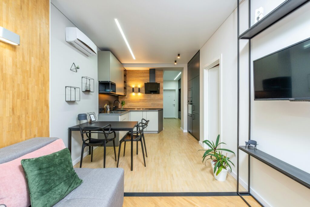 https://www.pexels.com/photo/contemporary-apartment-with-living-room-and-kitchen-7019013/