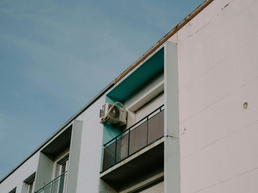 https://www.pexels.com/photo/close-up-of-an-apartment-building-11363688/
