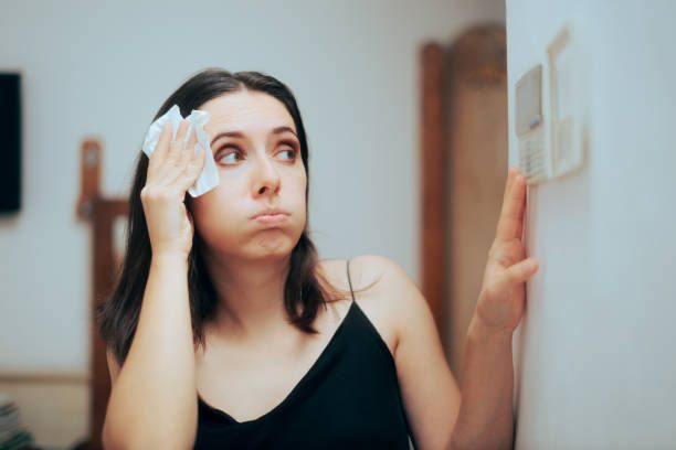 https://www.istockphoto.com/photo/woman-felling-hot-during-summer-setting-her-thermostat-gm1392670888-448840260?utm_source=pexels&utm_medium=affiliate&utm_campaign=sponsored_photo&utm_content=srp_inline_media&utm_term=BROKEN%20AIR%20CONDITIONER
