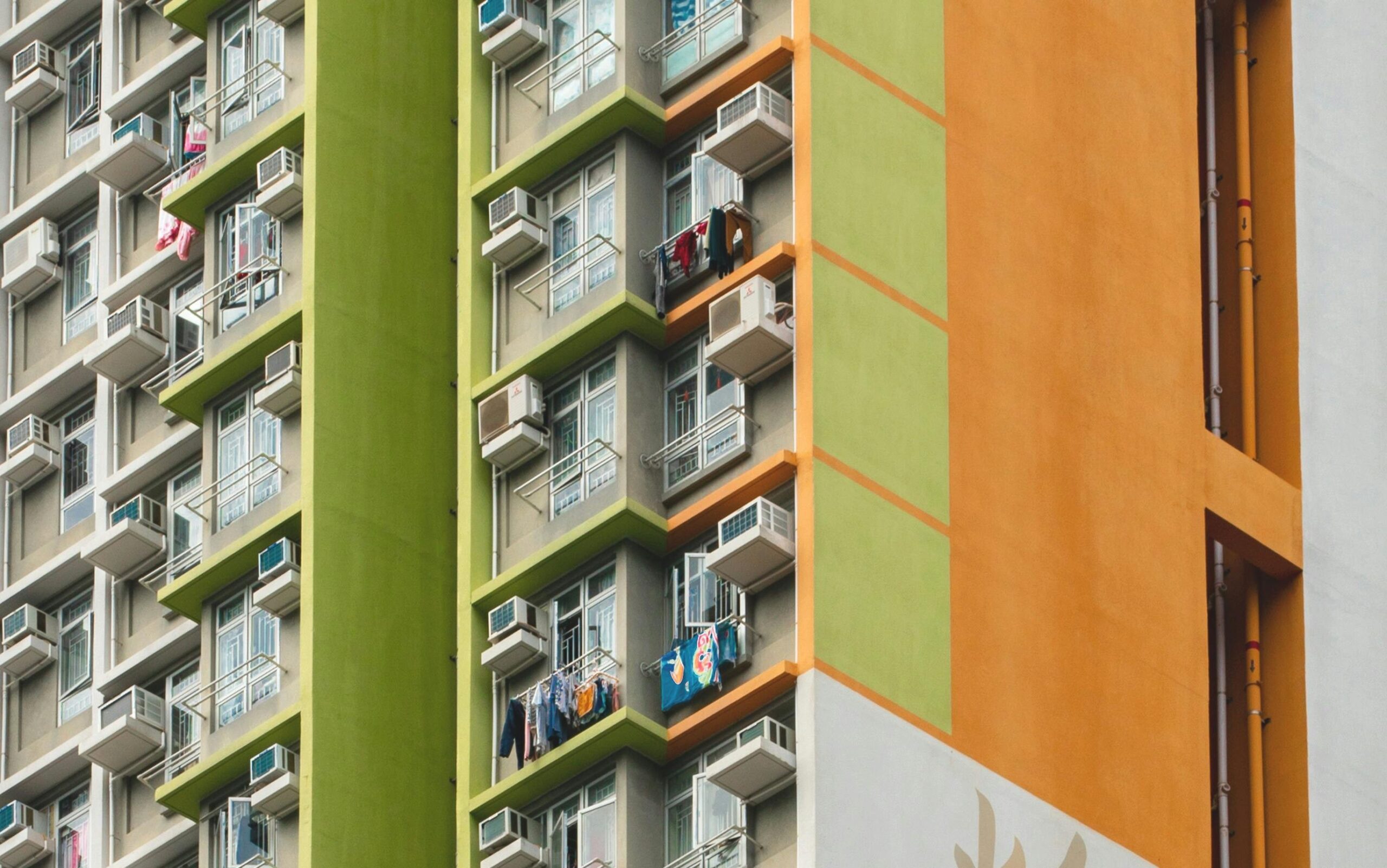 https://www.pexels.com/photo/green-and-orange-building-6594694/