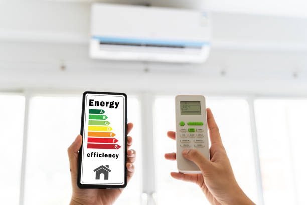 https://www.istockphoto.com/photo/the-cell-phone-is-displaying-an-energy-efficiency-rating-person-is-using-the-remote-gm2035153384-562307537?utm_source=pexels&utm_medium=affiliate&utm_campaign=sponsored_photo&utm_content=srp_inline-test3b_media&utm_term=aircon%20saved%20electricity