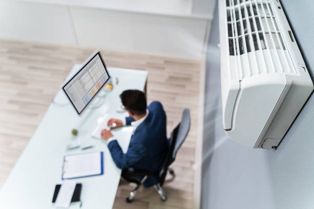 https://www.istockphoto.com/photo/businessman-enjoying-the-cooling-of-air-conditioner-gm1208085169-349055586?utm_source=pexels&utm_medium=affiliate&utm_campaign=sponsored_photo&utm_content=srp_inline_media&utm_term=office%20aircon