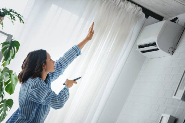 https://www.istockphoto.com/photo/turning-on-the-air-conditioner-gm1259269839-369055374?utm_source=pexels&utm_medium=affiliate&utm_campaign=sponsored_photo&utm_content=srp_inline_media&utm_term=AIR%20CONDITIONER%20HOT