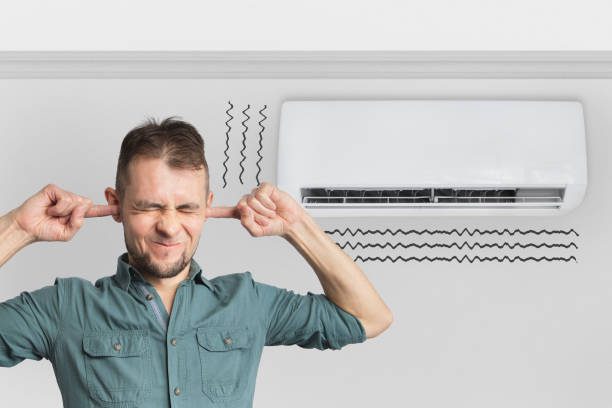 https://www.istockphoto.com/photo/the-air-conditioner-is-broken-makes-loud-noises-noises-and-vibrations-man-covering-gm1565705573-527529557?utm_source=pexels&utm_medium=affiliate&utm_campaign=sponsored_photo&utm_content=srp_inline_media&utm_term=aircon%20sounds