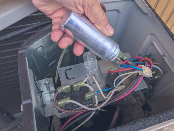 https://www.istockphoto.com/photo/air-conditioner-repair-by-technician-the-technician-replace-the-capacity-run-of-air-gm1250198685-364556232?utm_source=pexels&utm_medium=affiliate&utm_campaign=sponsored_photo&utm_content=srp_inline_media&utm_term=aircon%20compressor%20and%20capacitor