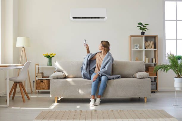 https://www.istockphoto.com/photo/woman-enjoying-cool-fresh-air-in-her-living-room-with-air-conditioner-on-the-wall-gm1379414613-442767015?utm_source=pexels&utm_medium=affiliate&utm_campaign=sponsored_photo&utm_content=srp_inline_media&utm_term=AIRCON%20HEATING